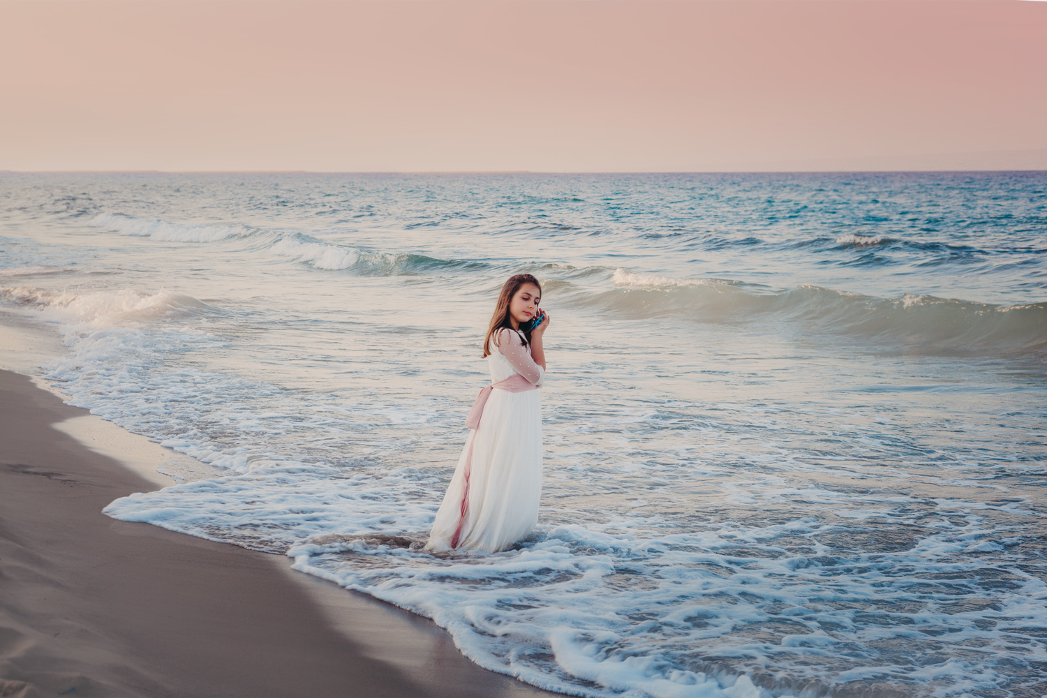 Sesión de comunión en la playa con estrella de mar